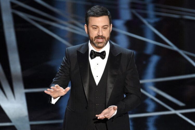 FILE - In this Feb. 26, 2017 file photo, host Jimmy Kimmel appears at the Oscars in Los Angeles. Follow-up heart surgery for Jimmy Kimmel's infant son was postponed because of family colds. In a statement Monday, Oct. 30, 2017, Kimmel's publicist said that Billy Kimmel's scheduled operation was delayed as a precaution. (Photo by Chris Pizzello/Invision/AP, File)