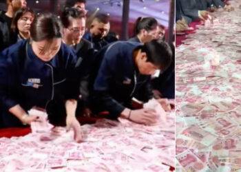 Viral στην Κίνα: 7.000 υπάλληλοι παίρνουν μπόνους $26 εκατ. με τα χέρια τους – Μετρητά πάνω στα τραπέζια