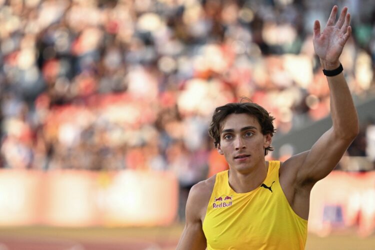 Sweden's Armand Duplantis celebrates after setting a new pole vault world record at 6,29m during the men's pole vault event of the Hungarian Athletics Grand Prix in Budapest, Hungary on August 12, 2025. (Photo by Attila KISBENEDEK / AFP)