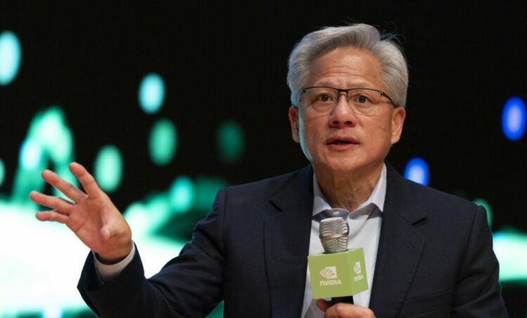 epa12494985 Nvidia CEO Jensen Huang speaks during a press conference at the Asia-Pacific Economic Cooperation (APEC) CEO Summit in Gyeongju, South Korea, 31 October 2025. The 2025 APEC annual meetings are being held in Gyeongju from 29 October to 01 November.  EPA/JEON HEON-KYUN